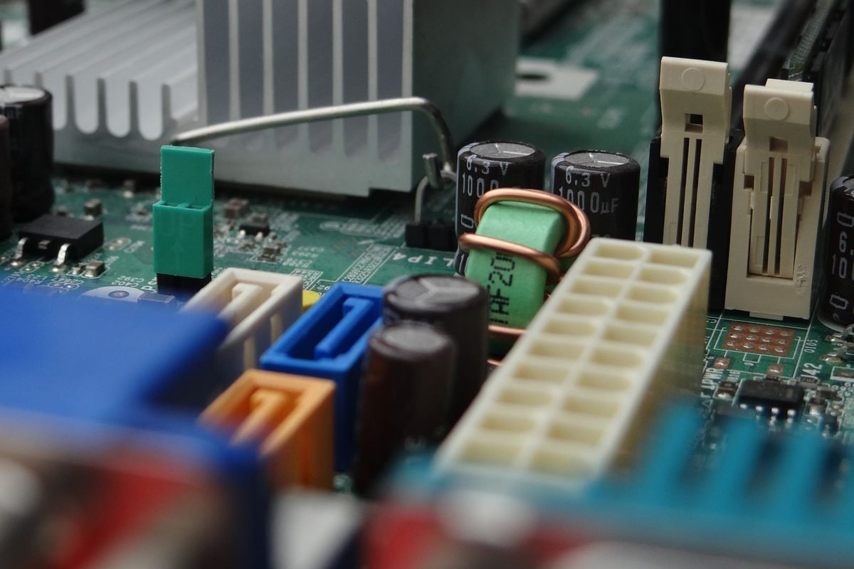 Close-up of motherboard connectors, capacitors and heatsinks