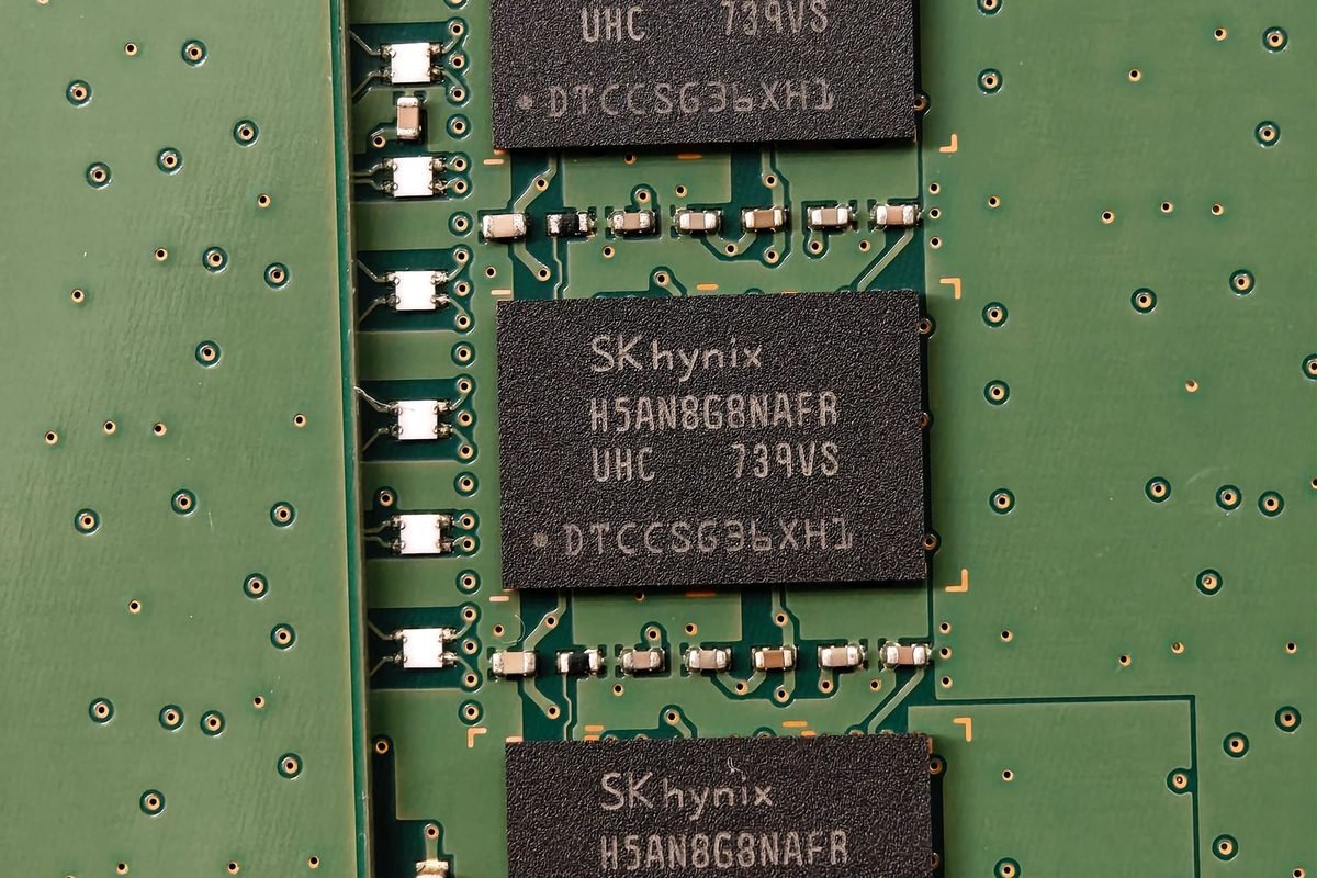 Close-up of SK hynix memory chips soldered onto a green circuit board