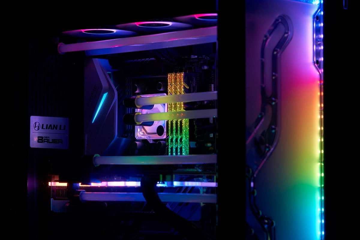 Gaming computer with RGB lighting and a glass side panel showing the internal parts
